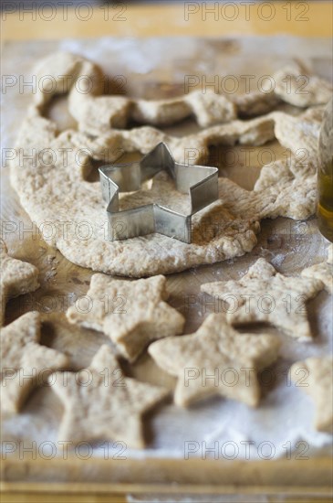 Close up of cookie cutter and dough