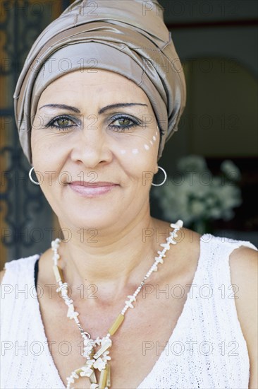 Mixed race woman wearing turban