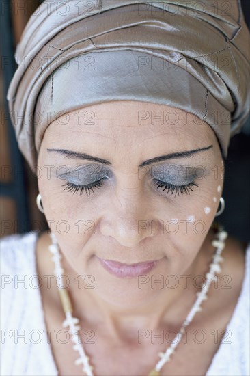 Mixed race woman wearing turban