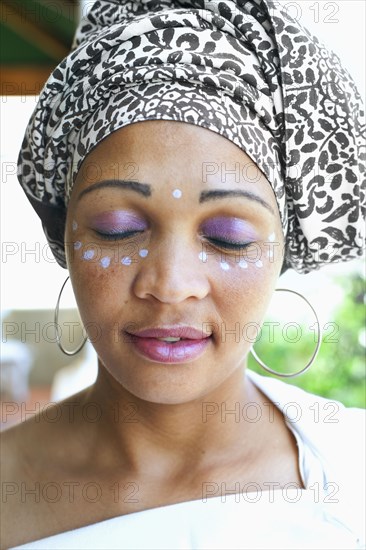 Mixed race woman wearing turban