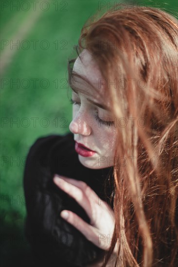 Pensive Caucasian woman