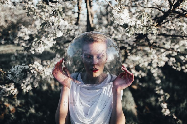 Caucasian girl wearing bubble helmet