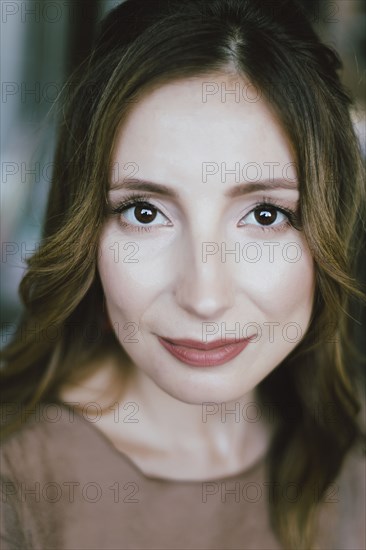 Close up of smiling Caucasian woman