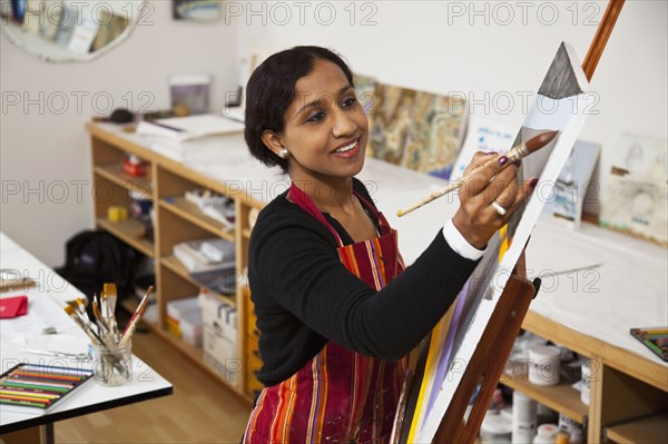 Indian woman painting