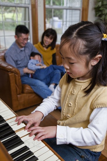 Korean girl playing piano