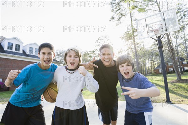 Boys playing basketball