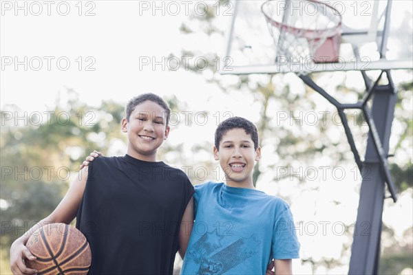 Boys playing basketball