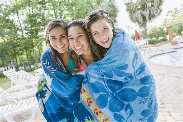 Caucasian teenagers wrapped in a towel