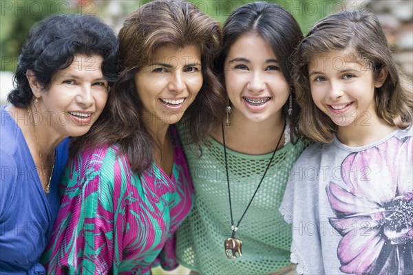 Smiling Hispanic family