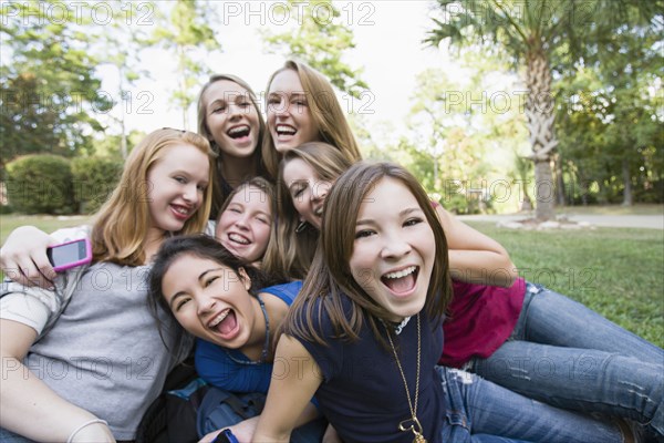 Friends hanging out together on grass