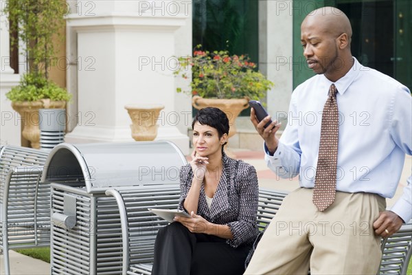 Business people working outdoors