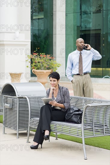 Business people working outdoors