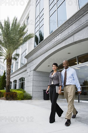 Business people walking together outdoors