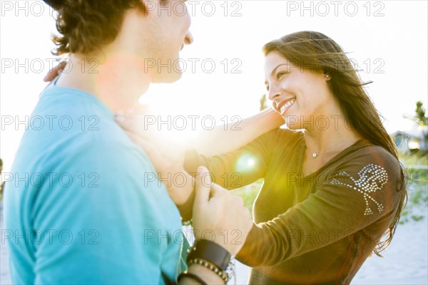 Couple talking outdoors