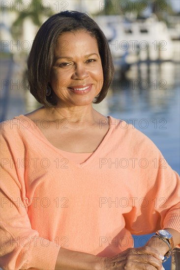 African American woman smiling outdoors