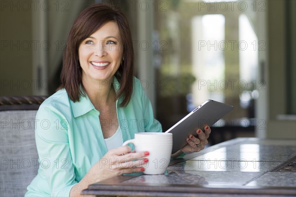 Caucasian woman using digital tablet