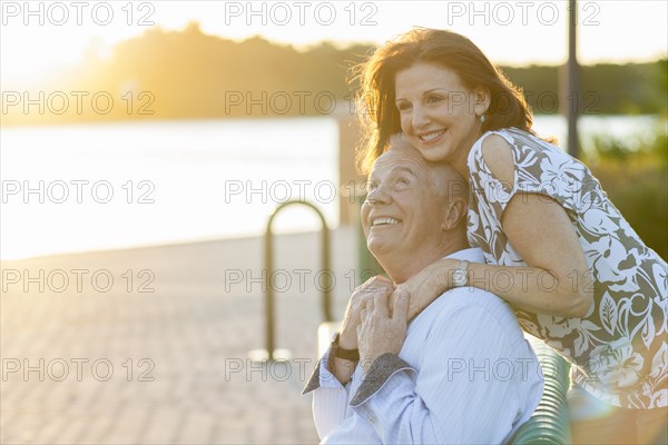 Older Caucasian couple smiling outdoors