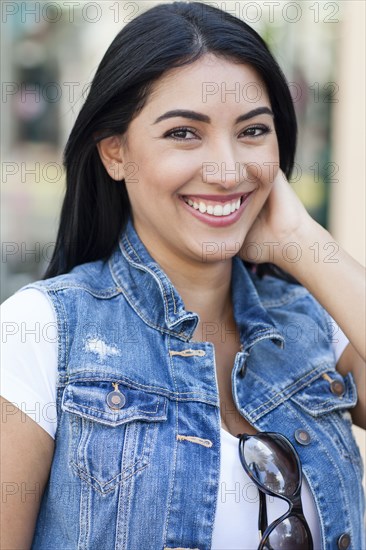 Close up of Hispanic woman smiling