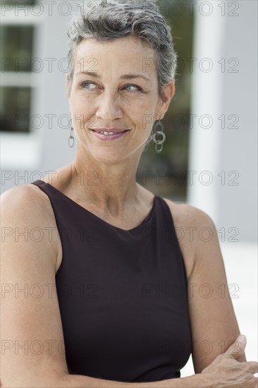 Close up of smiling woman wearing evening gown