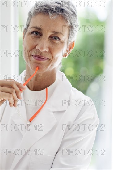 Close up of doctor holding eyeglasses