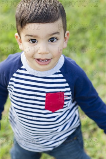 Close up of Hispanic boy outdoors