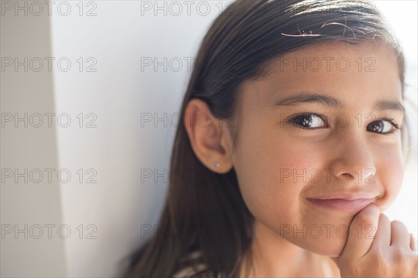 Close up of smiling girl indoors