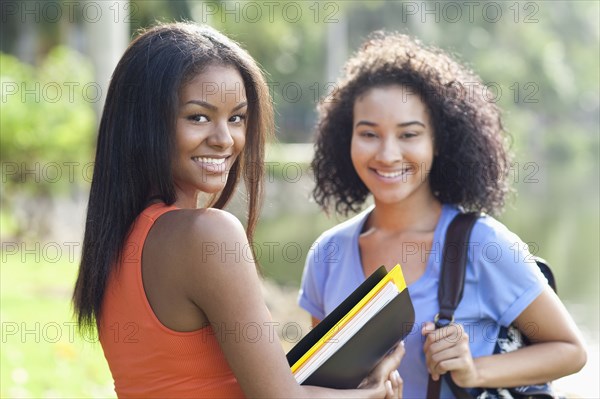 Black students smiling outdoors