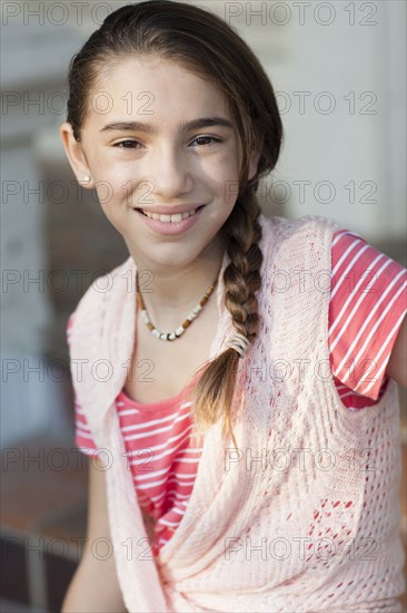 Close up of Hispanic girl smiling