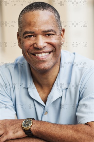 African American man smiling outdoors