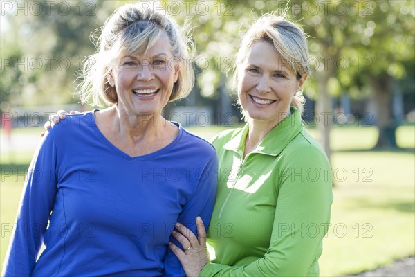 Caucasian women smiling in park