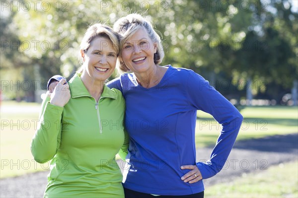 Caucasian women smiling in park