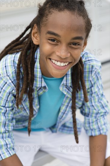 Mixed race boy smiling