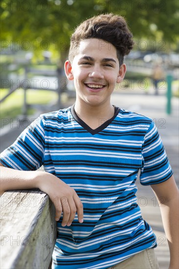 Hispanic boy smiling outdoors