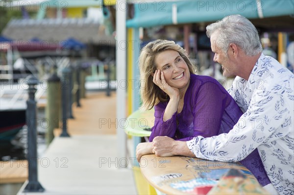 Older Caucasian couple smiling outdoors