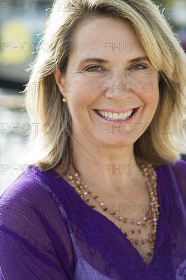 Older Caucasian woman smiling outdoors