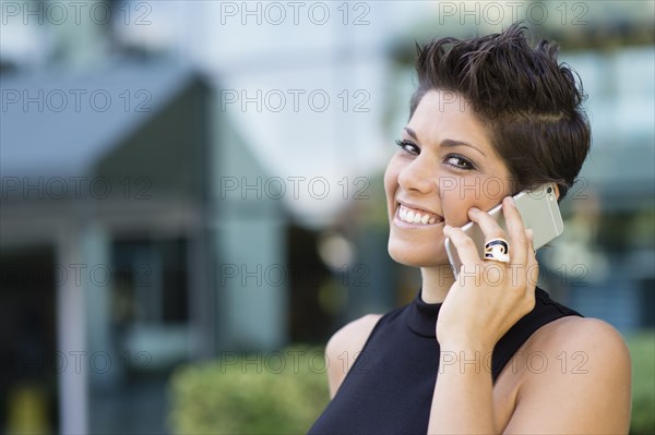 Caucasian woman talking on cell phone