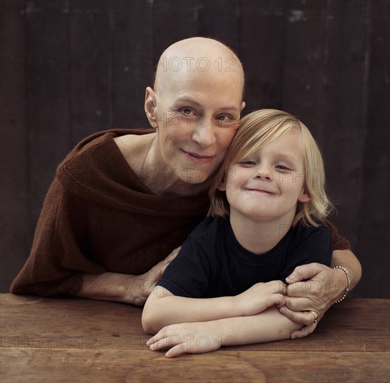 Older Caucasian cancer survivor with grandson