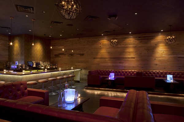 Tables and booths in empty nightclub