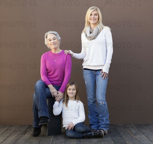 Three generations of Caucasian women smiling together