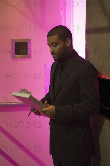 African American bouncer working at nightclub