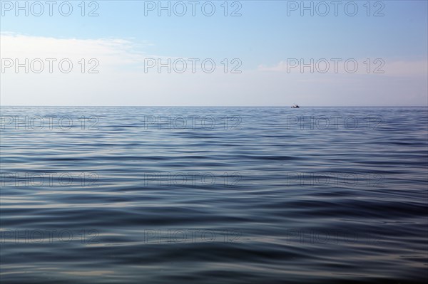 Lake under blue sky