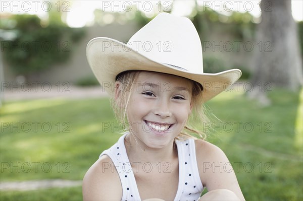 Caucasian girl in cowboy hat