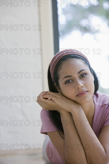 Young woman laying on floor