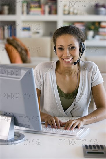 African American businesswoman wearing headset