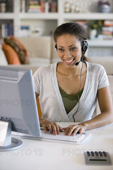 African American businesswoman wearing headset