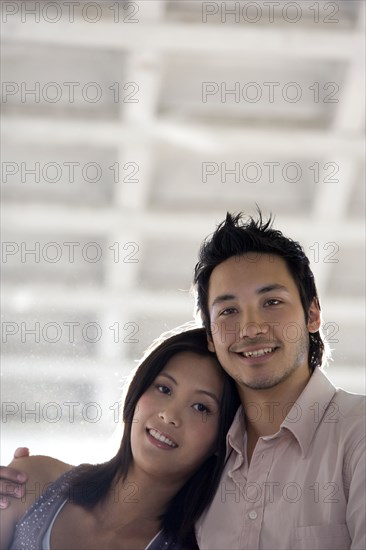 Asian couple hugging