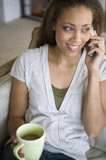 African American woman talking on telephone