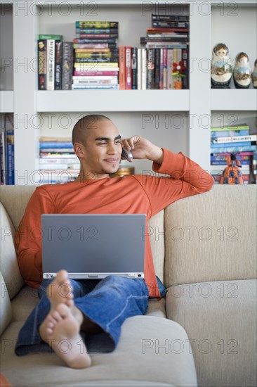 African American man talking on telephone