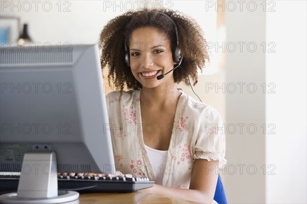 African businesswoman wearing headset