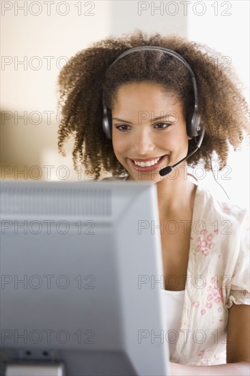 African businesswoman wearing headset